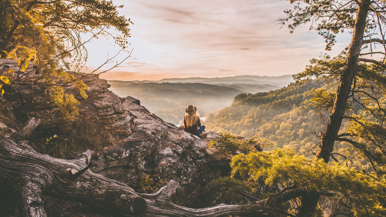 Sitting by a cliff